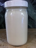 Jar of fresh goat milk